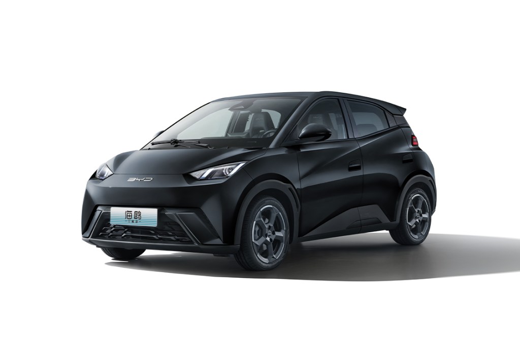 A stylish black BYD Seagull electric vehicle, showcasing its sleek design and compact size, positioned against a plain white background.